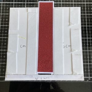 Picture of the foam tape on the back and the slider mechanism.