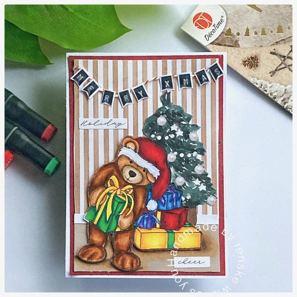 My finsished Christmas card with the digial stamp Pressie time.