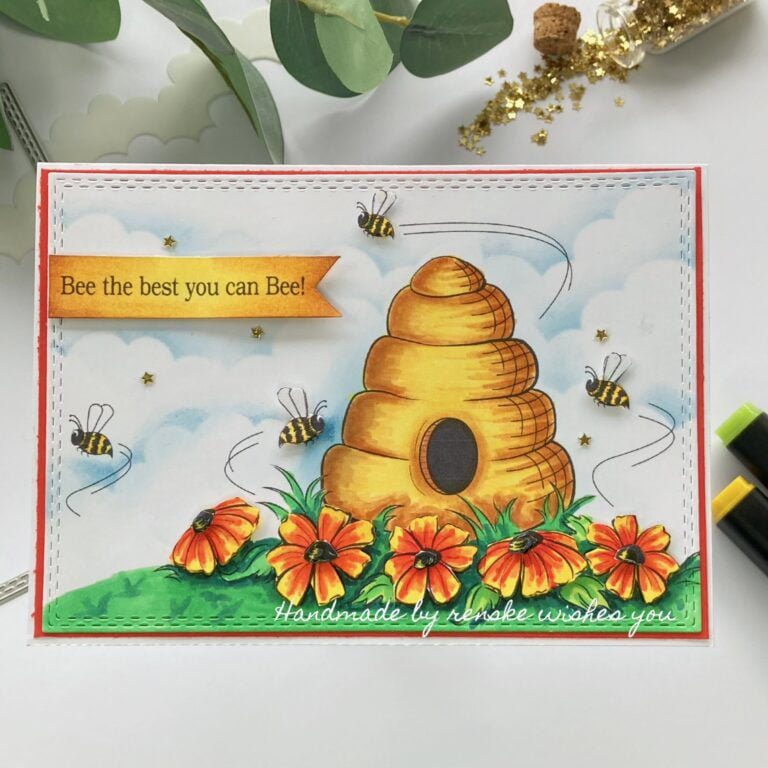 My finished "bee the best you can bee"card. I made the home of the bees look like gold and is surrounded by flower and grass.