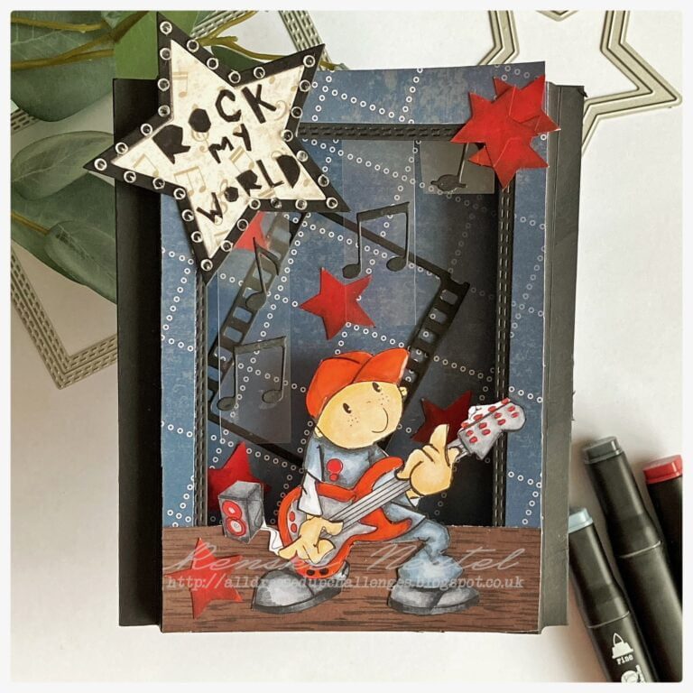 A shodow box card with the digital stamp Rock My World from All Dressed Up Stamp. I gave the boy a stage to play his music.