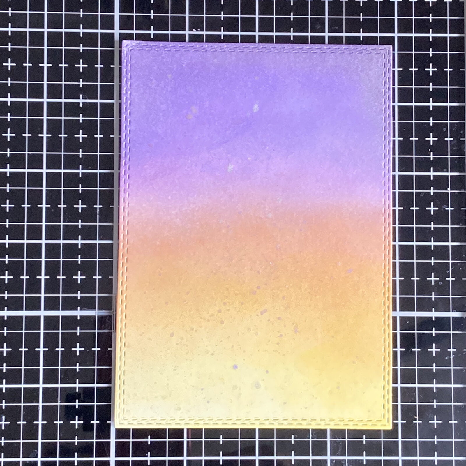 My finished background with the purple colors on top and the yellow/orange purples on the bottom.