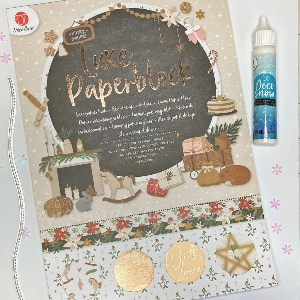 Materials used for this DIY Christmas card. A luxe paperblock, hill die, Deco Snow and embellishments.