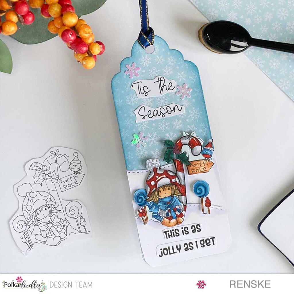 Handmade DIY Christmas Tag with Festive Winter Character and Snowy Landscape