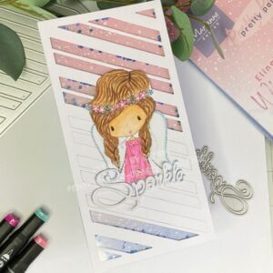Angled view of the completed shaker slimline card featuring Angel Wings digital stamp, sequins, and winter-themed background.