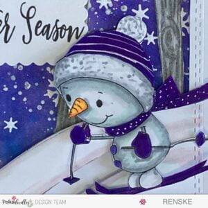 A close up picture from the coloured digital stamp Ski Time from Polkadoodles. A snowman on sky with a purple hat, scarf, and skies.