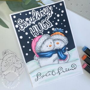 Alternative view of a handmade winter-themed card, capturing delightful snowmen in a warm embrace amid snowy hills, with intricate details and heartfelt sentiments.