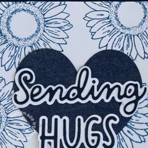 Close-up of Monochrome Blue Flower Background with Clear Stamps and Embossing