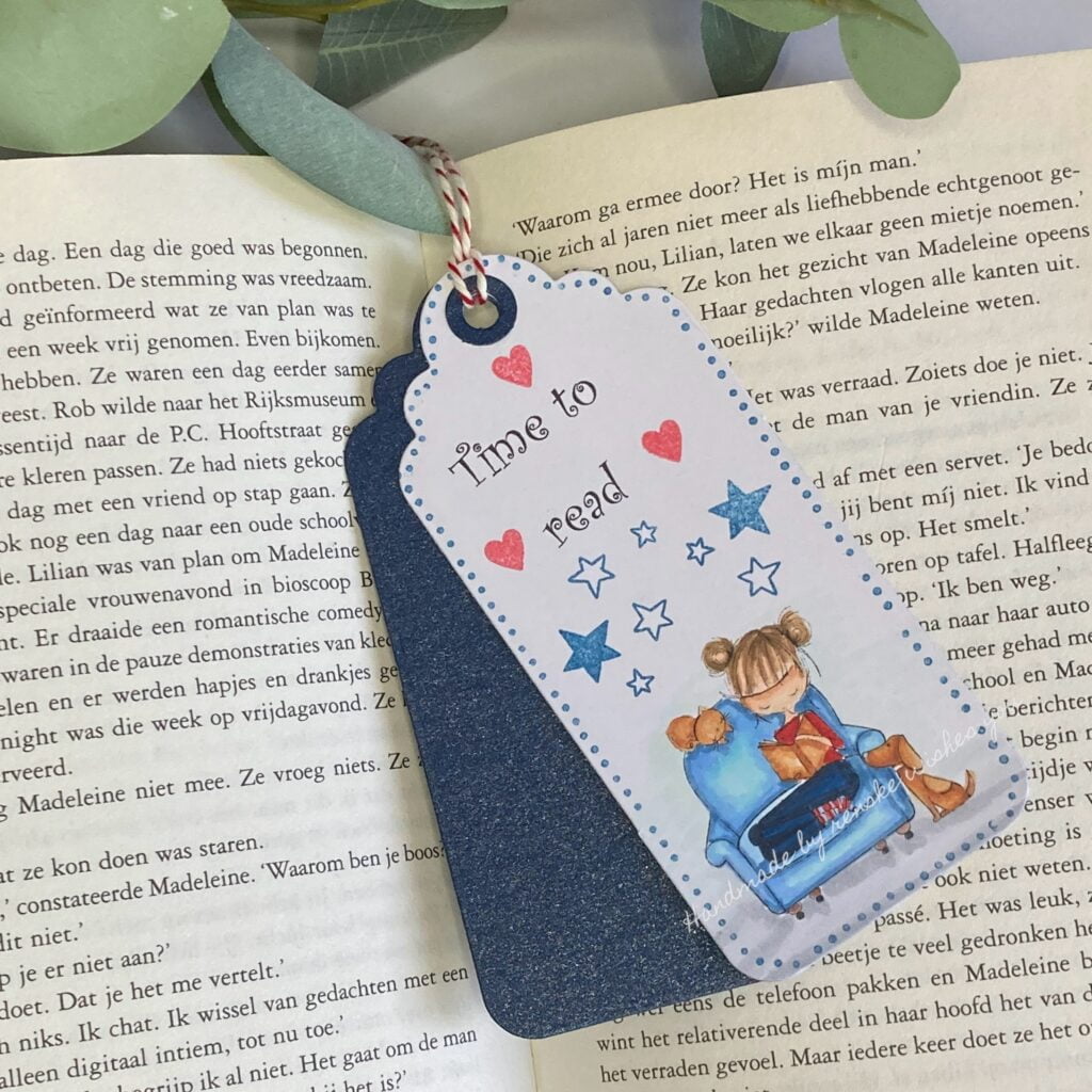 Easy Handmade Bookmark gracefully adorning an open book, enhancing your reading moments with creative charm.
