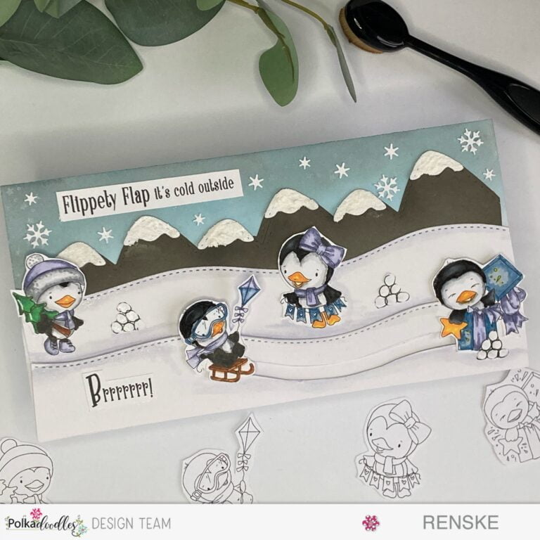 Handcrafted interactive winter-themed slimline slider card featuring four adorable penguins—Waddy, Wanda, and friends—playing in a snowy landscape, with mountains, snowbanks, and a slider mechanism for an engaging card-making project.
