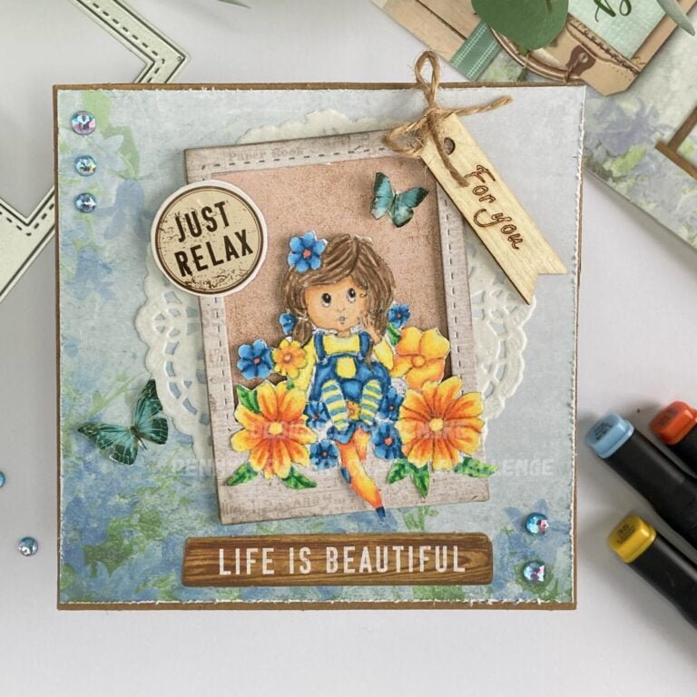 Overhead view of the complete handmade flower girl card displayed on a flat surface. The card features a Polaroid frame with a flower girl surrounded by colorful flowers.