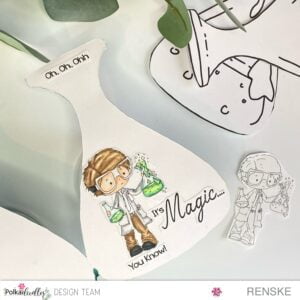 side of a handmade card with a science theme, featuring an image of a scientist in a white coat, green and blue color elements, and matching texts.