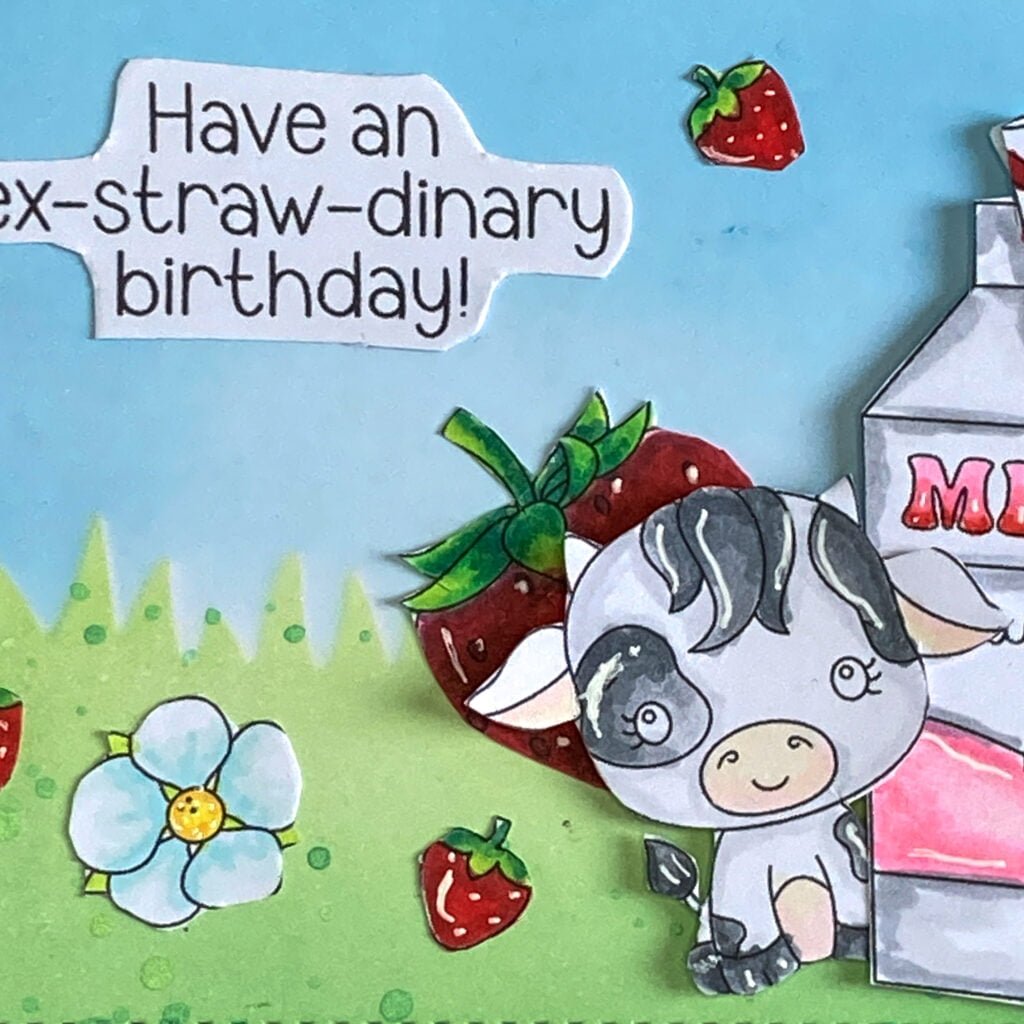 Close up picture coloured cow with strawberries A close-up photo of the colored digital stamp depicting a sitting cow with a large strawberry behind it. The cow is colored with shades of gray and brown, and the strawberry is colored in shades of red.