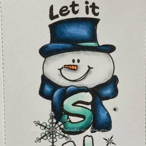Close up picture coloured stamp Vertical let is snow D.R.S. Designs Close-up image highlighting the intricately coloured snowman and the gradient letter 's' on the handmade snowman winter card. The snowman is adorned with carefully chosen hues, bringing it to life, while the gradient letter 's' complements the overall composition with its transition.