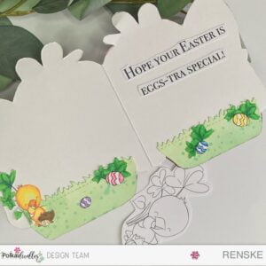 Inside picture Cute Easter Egg Basket Polkadoodles 02-03 An inside view of the Easter card, revealing a charming scene with a chick and Easter eggs, crafted using the Chocolate Time Chick Spring digital stamp from Polkadoodles.