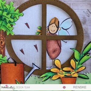 Easel card Lucy Monkman Polkadoodles 2 Close-up of the window in the easel card tutorial, revealing the digital stamp of a girl with flowers and a bow, beautifully positioned behind the window pane