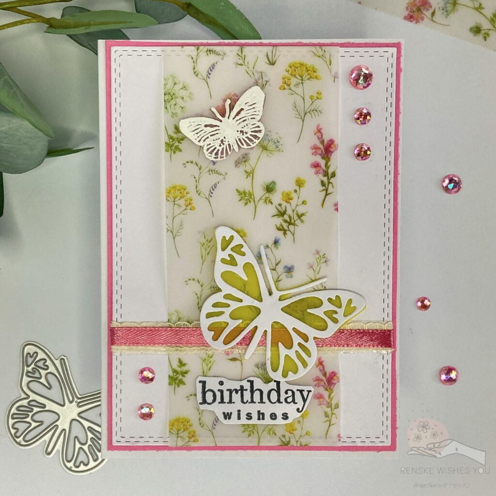 A top-down view of the complete birthday card showcasing vellum in card-making. The card features intricate vellum overlays and embellishments.