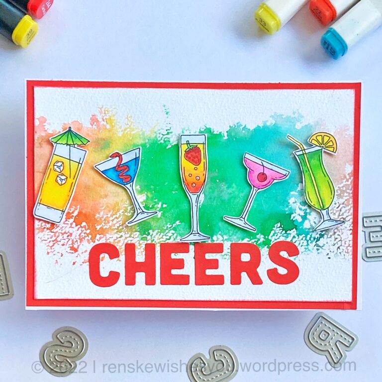 Handmade Cocktail card with bright rainbow colours, yellow, blue red pink and green on a ink smooshed background and with a red sentiment Cheers