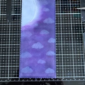 Ink blended background The Night Sky background made with distress inks and oxides. Having a purple blue sky with a moon, clouds and stars.