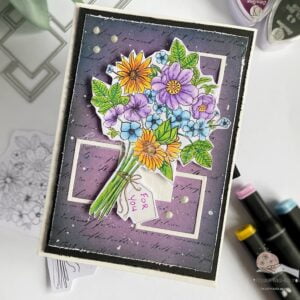 Thanks a Bunch All Dressed Up Stamps An angled top-down view of a handmade flower bouquet card made with All Dressed Up Stamps, highlighting the layered elements and vibrant colors of the flower bouquet against the distressed background.