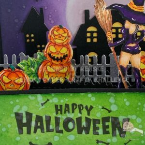 Close up picture of the front of the box the sentiment Happy Halloween Close-up of the front panel of the Halloween card in a box, clearly showing the 'Happy Halloween' sentiment.