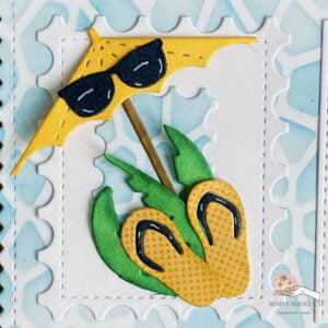 Close up picture of the umbrella with sunglasses and flip flops and palm tree leaves at the bottom Close up picture of the rarasol and sunglasses with slippers and palm tree leaves for a summer themed card with a swimming pool background.