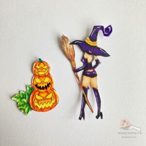 Coloured and cut digital stamp Witch with Pumpkings (1) Colored and cut-out digital stamp of a witch with pumpkins for a Halloween card in a box