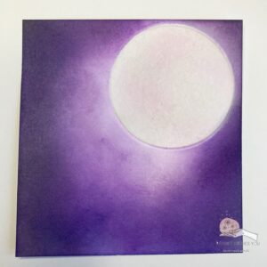 Finished Moonlit Purple sky with distress inks Created background for a Halloween card in a box, featuring a moon and purple sky with distress ink effects.