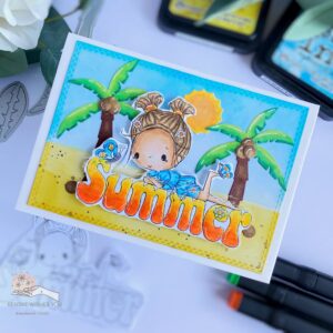 Handmade Summer card all dressed up stamps 3 Angled top view of a handmade summer card showing the complete design. The card features a vibrant beach scene with a colored digital stamp, palm trees, coconuts, and a sun. The background blends tumbled glass and mustard seed distress inks to create a sky and sandy beach.