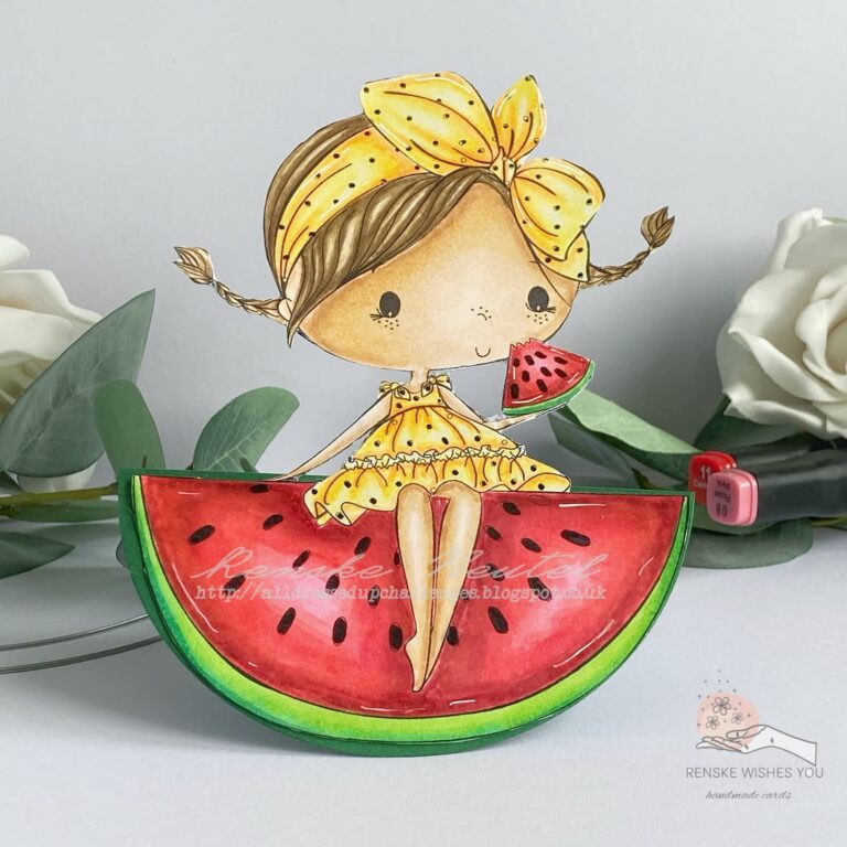 A front view of the completed watermelon rocker card. The girl on the watermelon slice stands out, with the card fully assembled and displayed upright