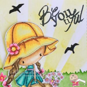 Close up from the top of the background panel (1) Close-up of the top section of the Flower Girl card showing the sentiment 'Be You Tiful' stamped in Memento ink. The text is placed in the top-right corner of the card, adding a heartfelt message to the scene.