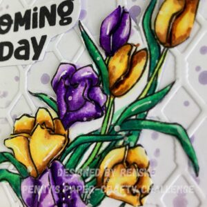 Close up picture of the layered flowers focuse on the tulips Here, you get a detailed view of the layered tulips from the digital stamp. This close-up highlights the careful layering technique used to create a 3D effect. The tulip petals are elevated with foam tape, adding dimension and making them stand out against the background. The rich colors and detailed shading of the tulips contribute to the card’s stunning, three-dimensional look.