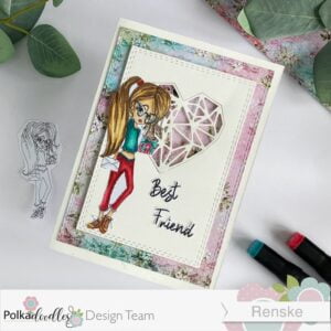 Handmade friendship card Ruby Gift with Glasses Polkadoodles andmade friendship card from Polkadoodles viewed from above at an angle. The card is flat but angled to showcase the overall design, including the digital stamp, sentiment, and die-cut heart. The layout highlights the card’s layered elements and decorative features.