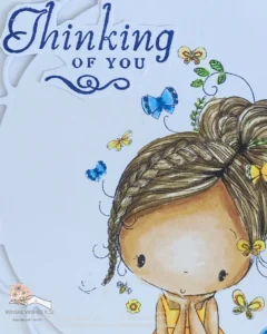 Close up picture of the sentiment Thinking of you Close-up of the 'Thinking of You' sentiment and the girl’s head from the Thinking of You card. The sentiment is neatly stamped and placed, with the girl's features highlighted, showcasing her thoughtful expression. The card design maintains a clean and simple aesthetic