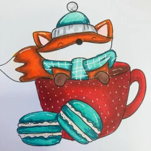 Close up picture of the coloured digital stamp A close-up photo of the coloured digital stamp of the fox. The fox is vibrantly coloured in shades of orange and brown, with highlights added to its fur. The hot chocolate cup is painted in deep reds, adorned with small white dots for detail. The macarons and scarf feature bright aqua and mint colours, adding a fun touch. The background is a simple white to emphasize the vibrant colours of the illustration.