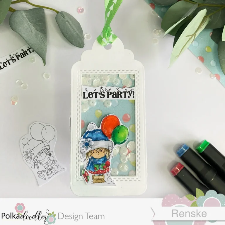 Handmade shaker tag tutorial for a january birthday. The tag has a girl with two balloons on it and a background paper with balloons. The tag is finished with a green ribbon