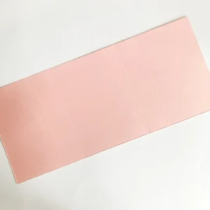 Scored pink sleeve for the box Pink cardstock with scored lines, forming the base of the sleeve for the valentine treat box.