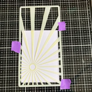 Stencil on rectagnle background panel A picture of the stencil on top of the background panel.