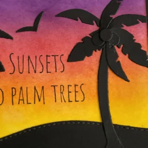 Palmtree on the right Detailed close-up of black silhouette palm tree on the right side of a tropical handmade card with glowing sunset background.
