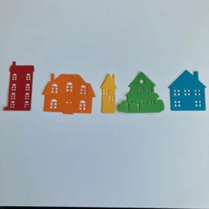 Die-cut houses in rainbow colours Die-cut paper houses in different sizes, ready to be used for cardmaking projects.
