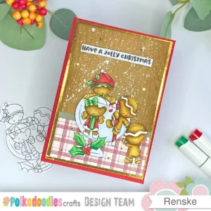 A full top-down view of the finished gingerbread man Christmas card. The scene shows gingerbread characters escaping a glass with a candy cane, set against a wood-grain background with red borders and subtle festive accents. The design has a warm handmade feel with traditional Christmas colours.