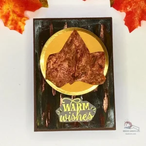 Metallic autumn card Finished handmade card featuring a weathered metal background with bronze and copper tones and layered fall embellishments
