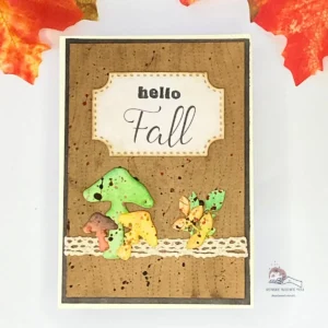 Woodgrain mushroom card Finished autumn card featuring a woodgrain background with layered leaves and a warm seasonal sentiment